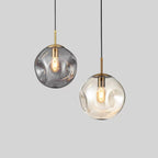 Novae Glass Pendant Light With Minimalist Silhouette