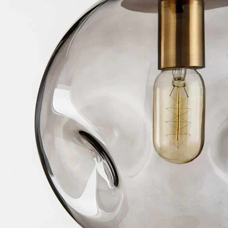 Novae Glass Pendant Light With Minimalist Silhouette
