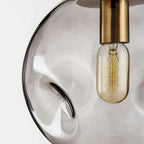 Novae Glass Pendant Light With Minimalist Silhouette